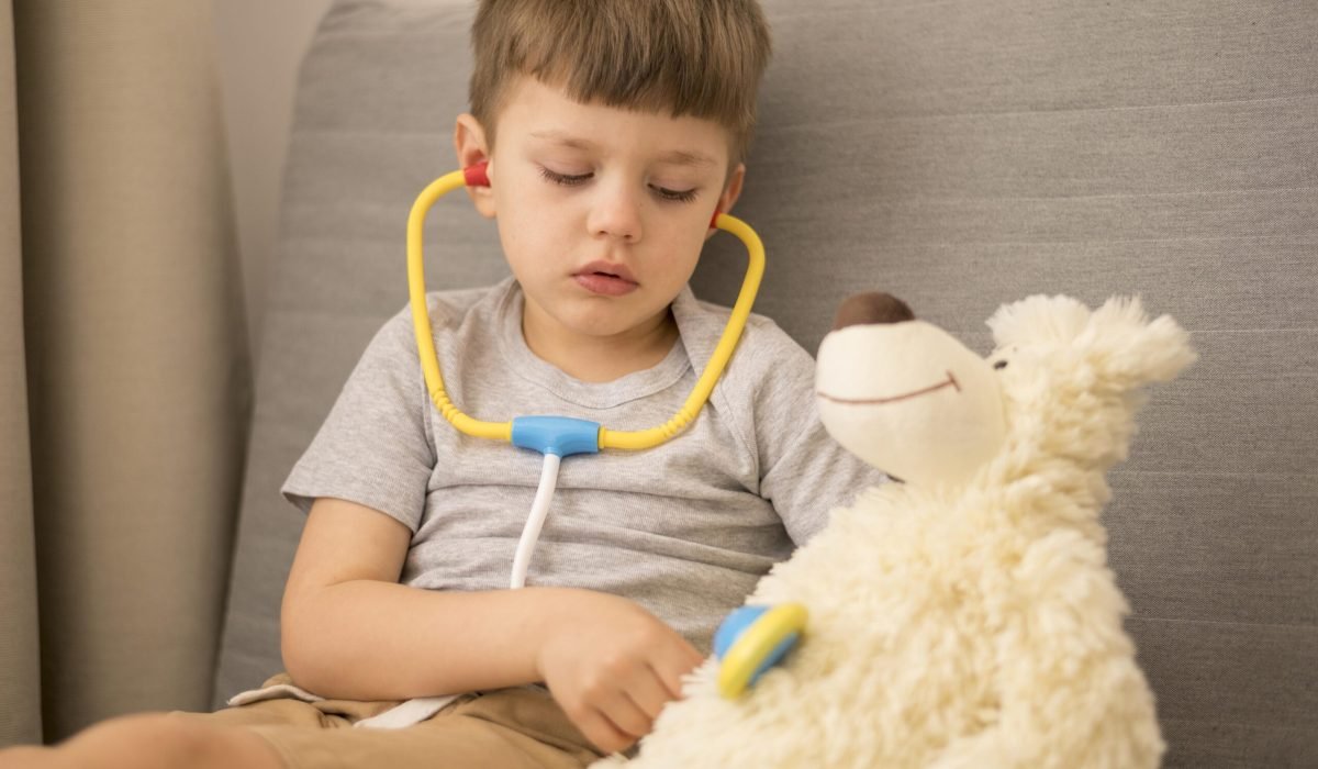 little-boy-with-tedy-bear-playing